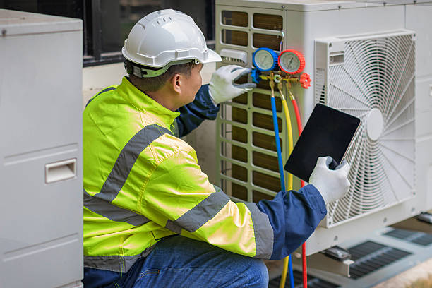 Professional Air Duct Cleaning technician working in Plainfield, NJ
